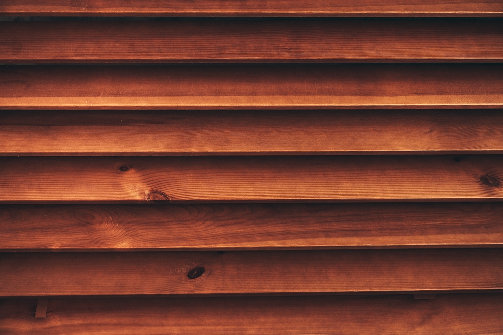 Explore the benefits of wood vs faux wood blinds.
